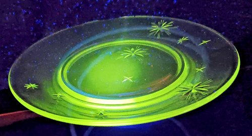 Atomic era  eight point stars uranium glass plate. 7 3 8".