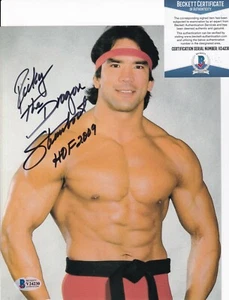 RICKY ""EL DRAGÓN* BARCO DE VAPOR firmado LUCHA LIBRE WWF 8X10 foto BECKETT BAS V24230 - Imagen 1 de 1