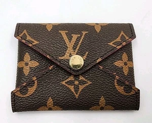 Pochette pochette pochette LOUIS VUITTON Kirigami piccola monogramma tela marrone - Foto 1 di 6