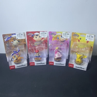 Super Smash Bros. Amiibo Lot of 4 - Pikachu Peach Ness & Duck Hunt - Image 1 of 4
