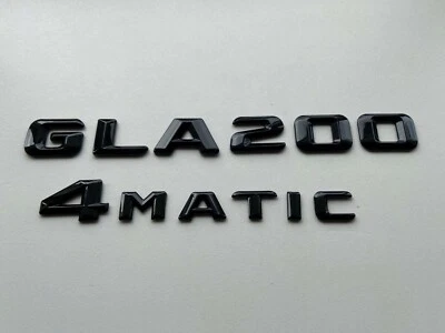 НОВЫЙ MERCEDES BENZ GLA200 4MATIC 4 MATIC ЗАДНИЙ ЗАГРУЗКИ НАЗАД ГЛЯНЦЕВЫЙ ЧЕРНЫЙ ЗНАЧКИ - Изображение 1 из 2