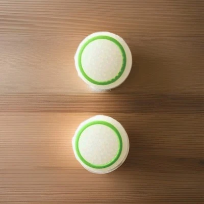 Universal PS Portal Thumbstick Joystick GLOW IN DARK Grips Green White Grips  - Image 1 of 4