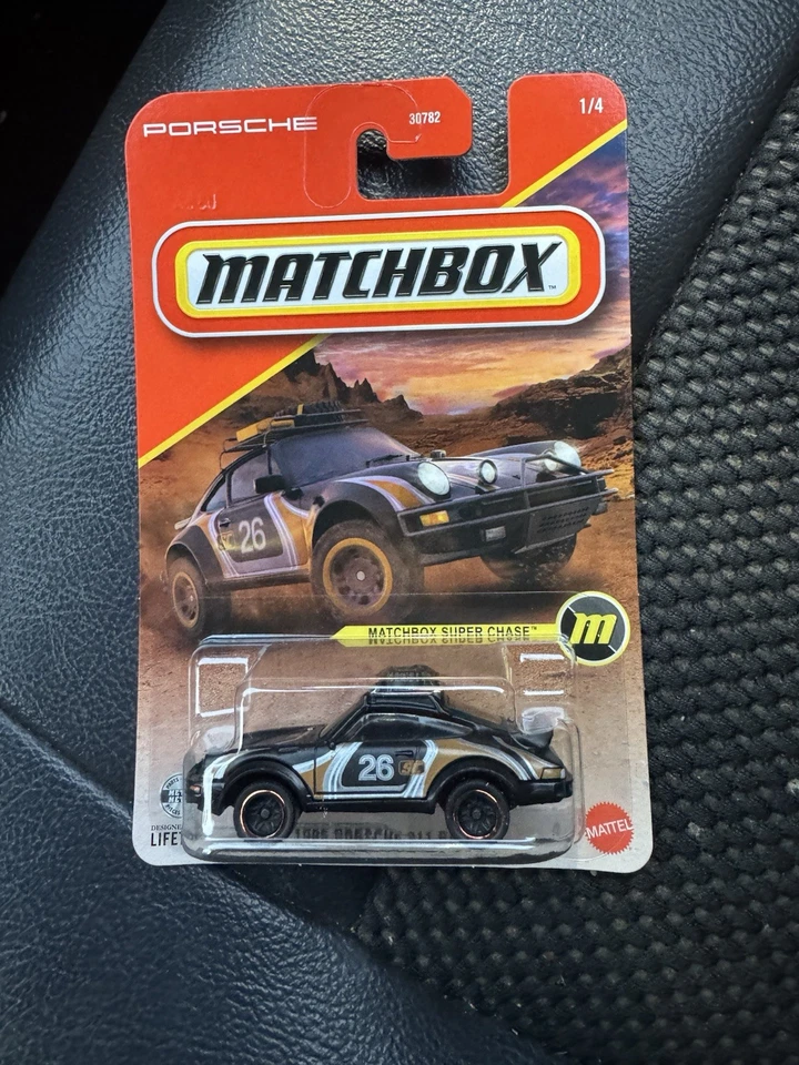 Matchbox 1985 Porsche 911 Rally Super Chase 1/64 (2026 Case A)  - Image 1 of 1