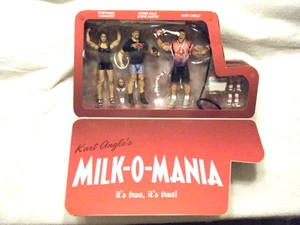 WWE Elite Epic Moments MILK-O-MANIA Kurt Angle STONE COLD Stephanie SEALED Box! - Bild 1 von 9