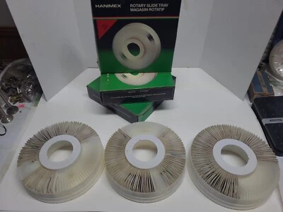 Lote de 3 bandejas deslizantes giratorias vintage Hanimex sin derrames cada una tiene capacidad para 100 diapositivas de 2"x2" Foto 1 de 4