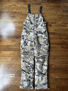 Under Armour UA RUT Camo Bib Pants Windproof Large Fleece Forest SAMPLE Sz L - Picture 1 of 5