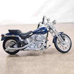 Motocicleta Harley-Davidson Softail Deuce FXSTD escala 1:18 diecast Maisto azul - Imagen 1 de 10