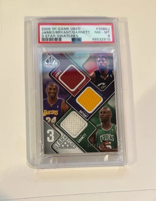 2009 SP Game Used 3 Star Swatches Kobe Bryant / Lebron James/Kevin Garnett PSA 8 - Image 1 of 4