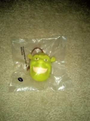 General Mills Shrek 2004 brilla en la oscuridad dientes y ojos Foto 1 de 2