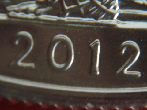ERROR-ONE (1)  BU/MS 2012 US Silver Eagle with a Doubled Date ERROR Cover