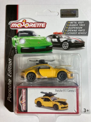 Porsche 911 Carrera S jaune avec skis - MAJORETTE Porsche Edition -  1/64 1 - Photo 1/2
