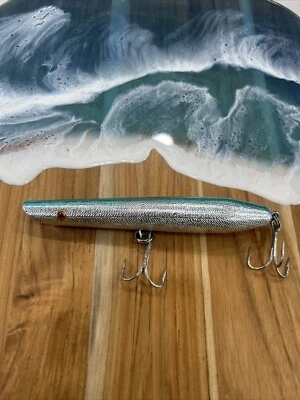 "Señuelo de pesca vintage de algodón Cordell lápiz popper azul/plateado 6"" Topwater" Foto 1 de 4