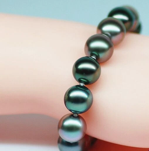 HUGE7.5-8"10-11MM TAHITIAN GENUINE BLACK PEACOCK GREEN PEARL BRACELET ROUND  AAA - Image 1 of 1