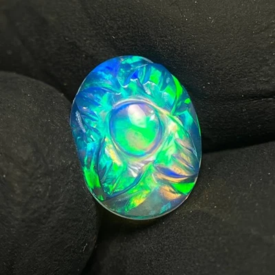 Deslumbrante ópalo etíope tallado piedra preciosa Welo multi cabujón de ópalo de fuego de 1,40 quilates Foto 1 de 4