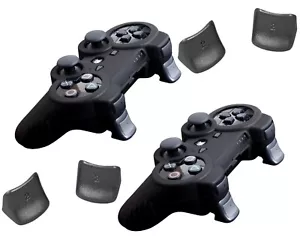 CONFEZIONE 2x custodia in silicone skin + 2x pulsanti trigger per controller Sony PS3 - Foto 1 di 5
