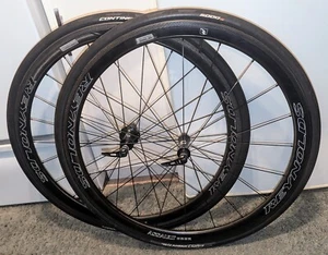 REYNOLDS ASSAULT CARBON WHEELSET 700c W/CONTINENTAL 5000 700x25c CLINCHERS - Picture 1 of 7