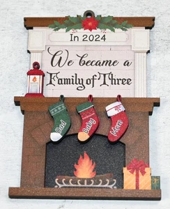In 2024 We Became A Family Of Three Wooden Christmas Ornament NEW Size 3"X3" - Picture 1 of 3