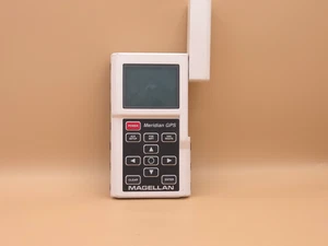 Navegador satelital GPS portátil Magellan Meridian12001 blanco para piezas sin probar - Imagen 1 de 7