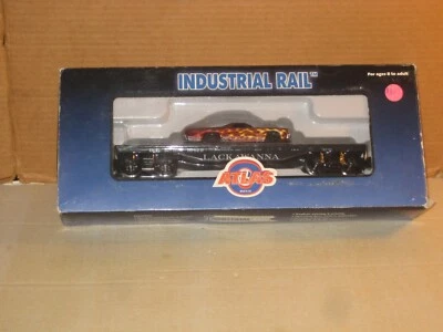 Atlas O Gauge Industrial Rail Lackawanna Flatcar w/El Camino looking car - Image 1 of 3