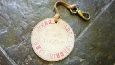 Porte clé sac en cuir CATHERINE PARRA en très bon état. - Photo 1/4