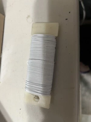 1 paddle of floral wire paddle 22 gauge white   - Image 1 of 2