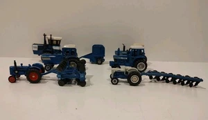 1/64 Ertl Ford Diecast Tractor Lot Blue W/ Impliments - Picture 1 of 7