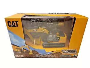 Excavadora hidráulica Diecast Masters 1:64 CAT 320F L con martillo de canastilla - Imagen 1 de 3