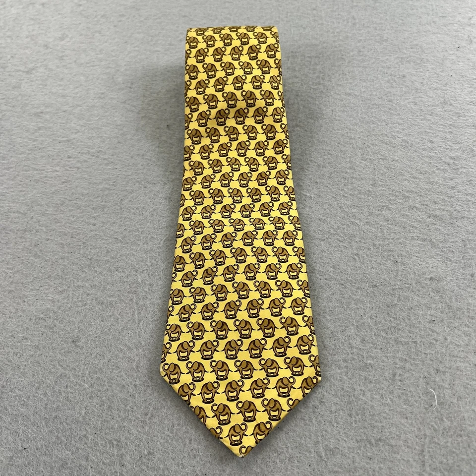 Corbata de seda Burberrys para hombre amarilla marrón con estampado de elefante hecha en Inglaterra Foto 1 de 4