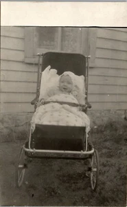 Vintage RPPC Foto Postkarte Happy Baby im Kinderwagen Miss Vie Anfang 1900 - Bild 1 von 3