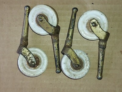 ANTIQUE Set 4 White Porcelain Swivel Furniture Caster Wheels 1 5/8"x 1/2" w/ Leg - Image 1 of 2