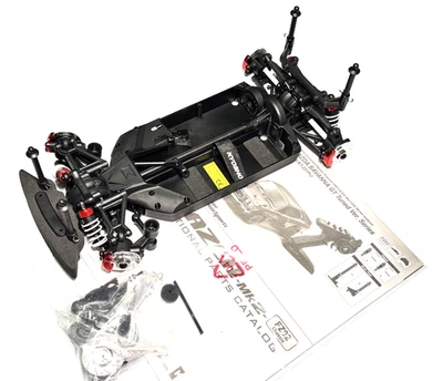 Kyosho Fazer Mk2 FZ02 1972 Mazda Savanna GT chasis de rodillo deslizante 34428 Foto 1 de 4