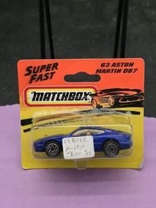 1993 MATCHBOX SUPERFAST 63 BLUE ASTON MARTIN DB-7 LAGONDA NEW ON CARD - Picture 1 of 2