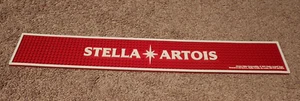NEU STELLA ARTOIS GUMMI BAR MATTE 24" X 3,5" BIER BRAUEREI MANN HÖHLE WOHNKULTUR - Bild 1 von 4