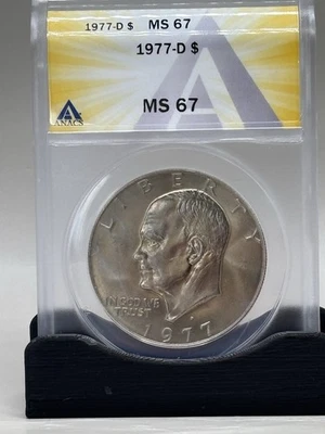 1977-D Eisenhower $ANACS MS67. Gorgeous ultra-gem Ike dollar Lightly Toned - Image 1 of 2
