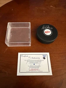 Adam Oates #21 Autographed Detroit Red Wings Hockey Puck - Picture 1 of 4