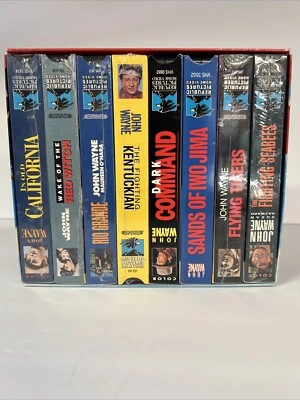 The John Wayne Larger Than Life Collection VHS 8 Full Length Movies. 6 Sealed - Image 1 of 4