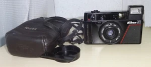 👌Nikon L35AF 1000 ISO 35 mm fotocamera punta e scatta pellicola con cordino, custodia, tappo obiettivo - Foto 1 di 6