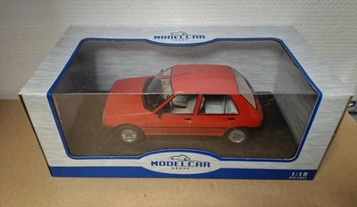 Peugeot 205 rosso 1984 1/18 scatola originale nuova - Immagine 1 di 3