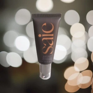 Crema hidratante tintada Saie Slip Tint Dewy FPS 35 - TONO 5,5 CINCO + MEDIO - CADUCIDAD 02/25 - Imagen 1 de 11