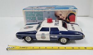 J390 VINTAGE 1960/70'S? BATTERY OPERATED NO STOP POLICE CAR WITH BOX