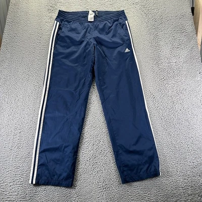 Pantalones deportivos Adidas vintage para hombre medianos azules forrados de malla de poliéster sueltos 3 tiras Foto 1 de 4