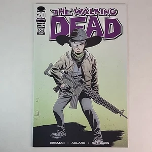 The Walking Dead #104 NM 1ère impression image Rick Carl Michonne EXCELLENT ÉTAT - Photo 1/6