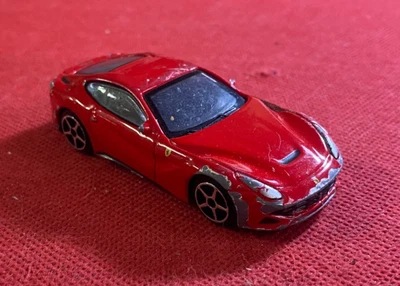 BBURAGO Modellino Auto FERRARI F12 BERLINETTA 11529 Metallo Rosso 1:64 - Immagine 1 di 3