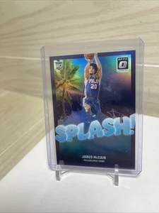 2024-25 Donruss Optic Jared McCain Splash! Rookie Viola Holo Prizm - Foto 1 di 6