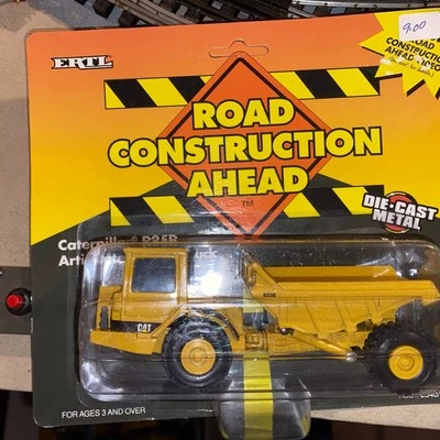 ERTL Road Construction Ahead Die Cast Catepillar D25D Articulated 1:64 Scale New - Image 1 of 2