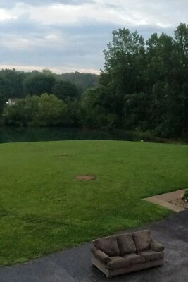 Forest green, moderatelyused, 3 person binge couch, and very clean. - Image 1 of 3