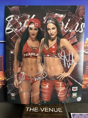 BELLA TWINS (WWE) Brie &Nikki dual signed Autographed 8x10 photo - AUTO COA - Image 1 of 2