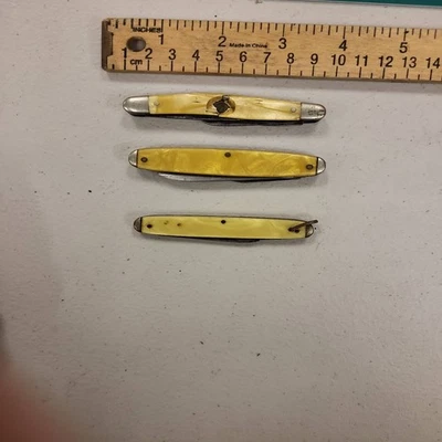 Vintage Pocket Knives Lot 3 Small Folding Knife Yellow Handles Collectible - Image 1 of 3