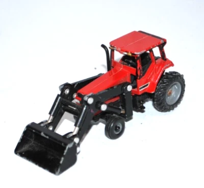 Vintage ERTL Case IH International 7130 Farm tractor W/ Loader Diecast 1:64 - Image 1 of 4