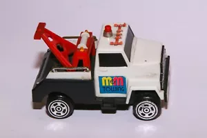 Plastic die cast white tow truck. Friction drive. M & M Towing - Picture 1 of 5